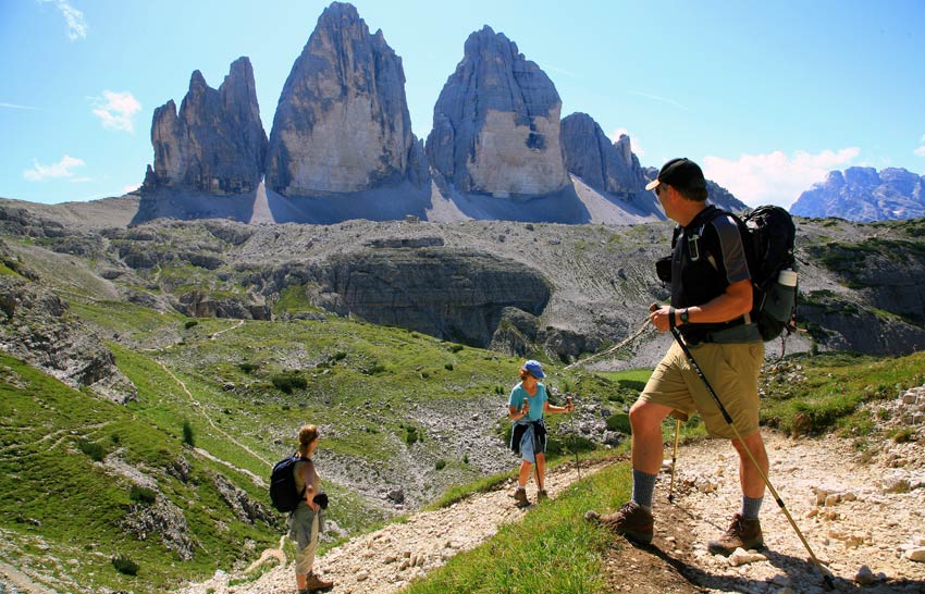 Active travellers using walking poles on their Europe holiday