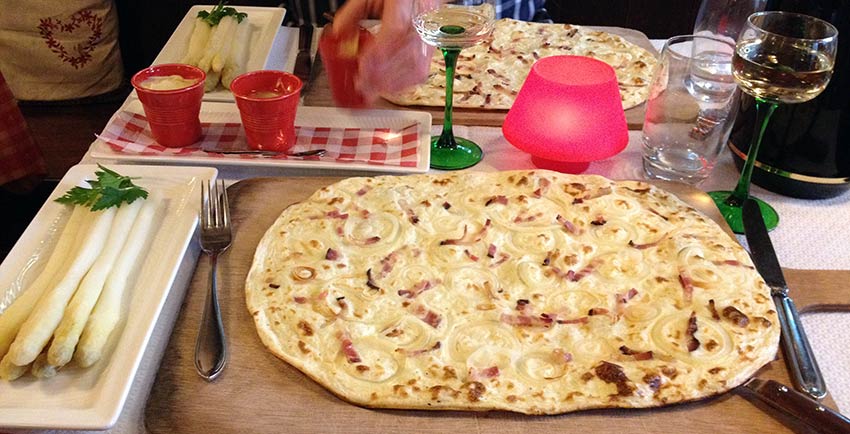 Food in France: tarte flambee and asparagus - walking holidays Alsace